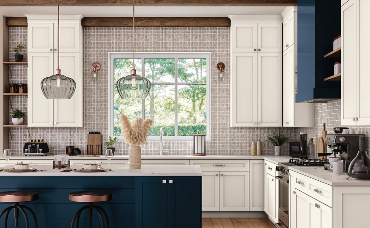 Blue and white tile backsplash in a kitchen display at Kiba Studios in North Olmsted
