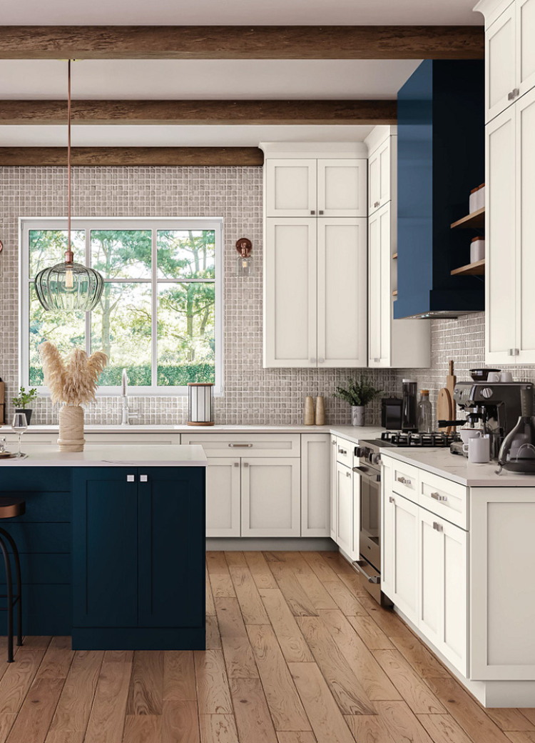 Blue and white tile backsplash in a kitchen display at Kiba Studios in North Olmsted