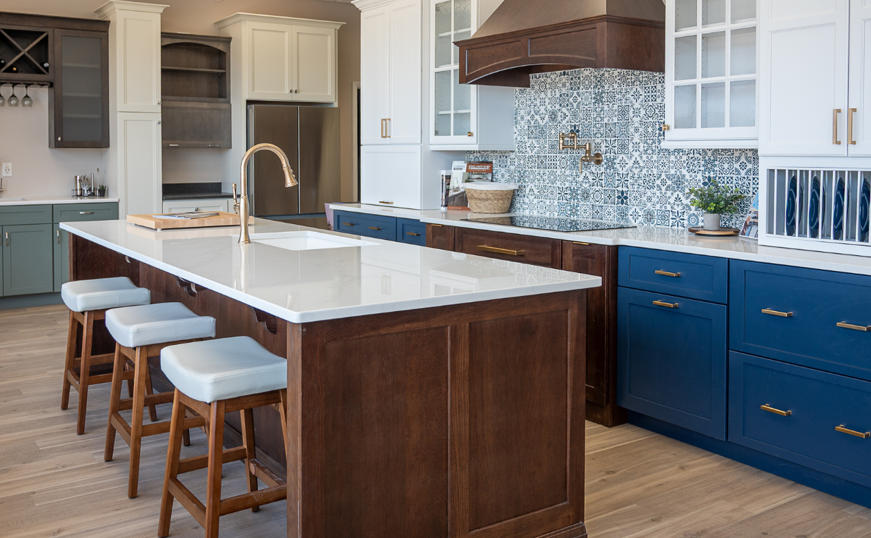 White countertops in a kitchen display at Kiba Studios in North Olmsted