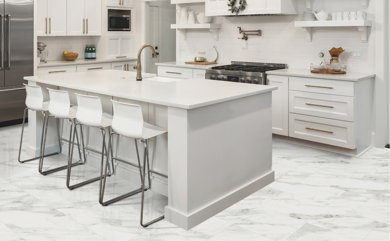 custom white countertops in a kitchen with blue, white and dark cabinetry