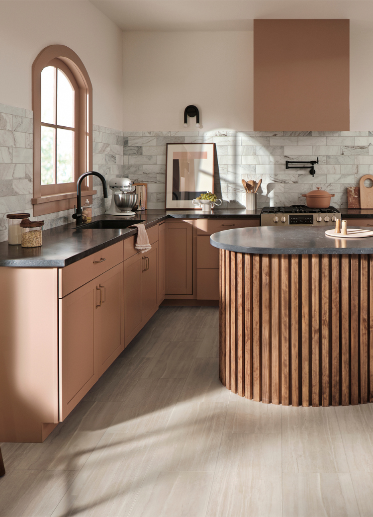 Black countertops in a kitchen display at Kiba Studios in North Olmsted