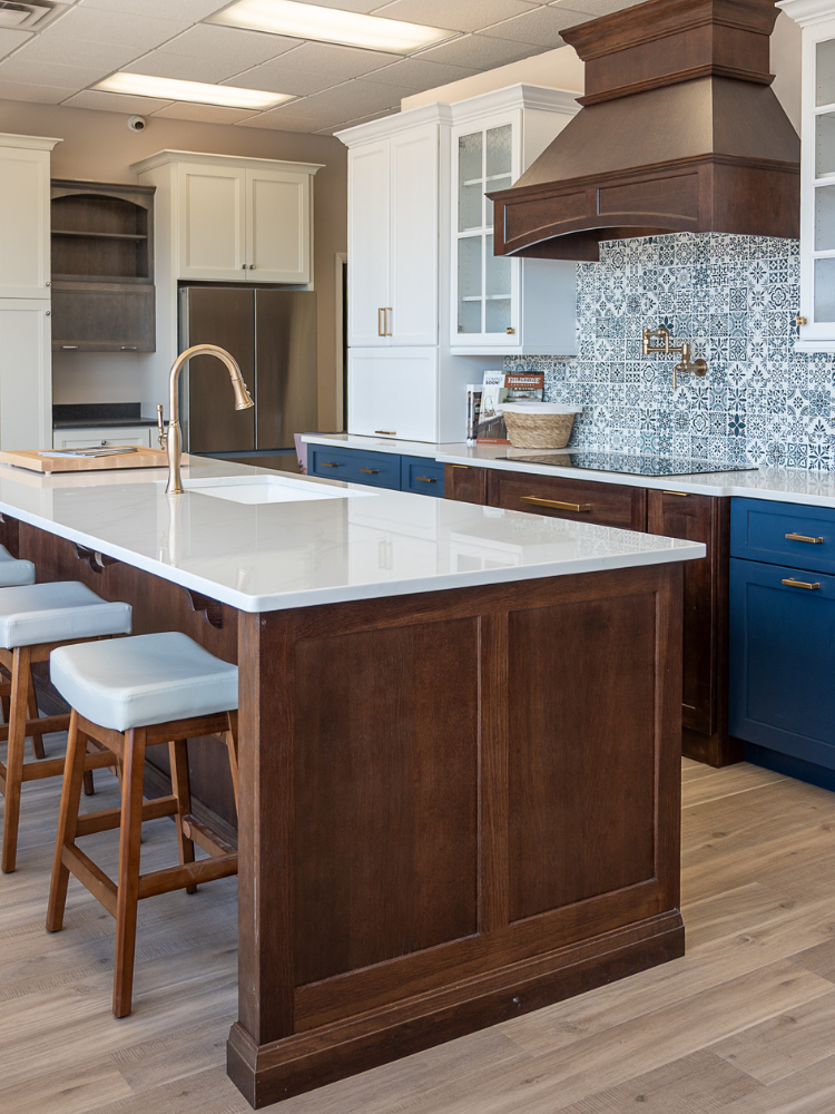 White countertops in a kitchen display at Kiba Studios in North Olmsted