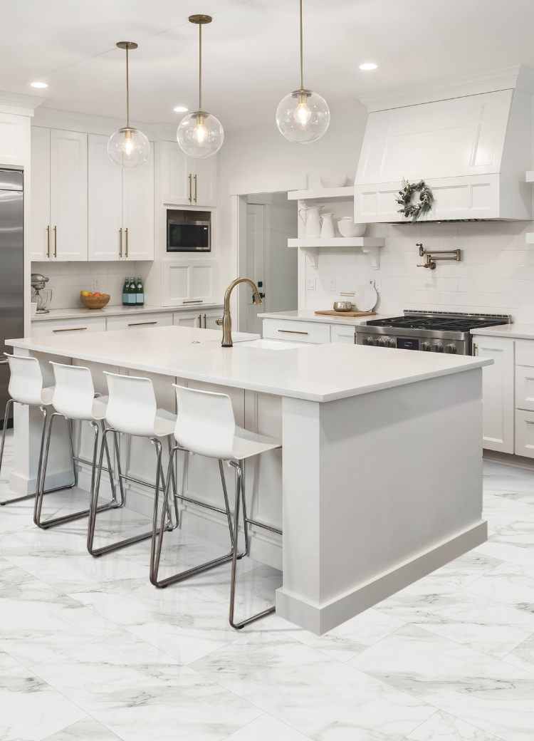custom white countertops in a kitchen with blue, white and dark cabinetry