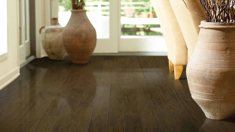 dark wood look laminate flooring in a modern dining room