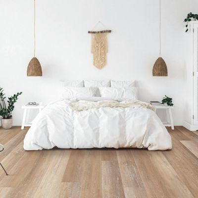 luxury vinyl plank flooring in a bright bedroom North Olmstead OH